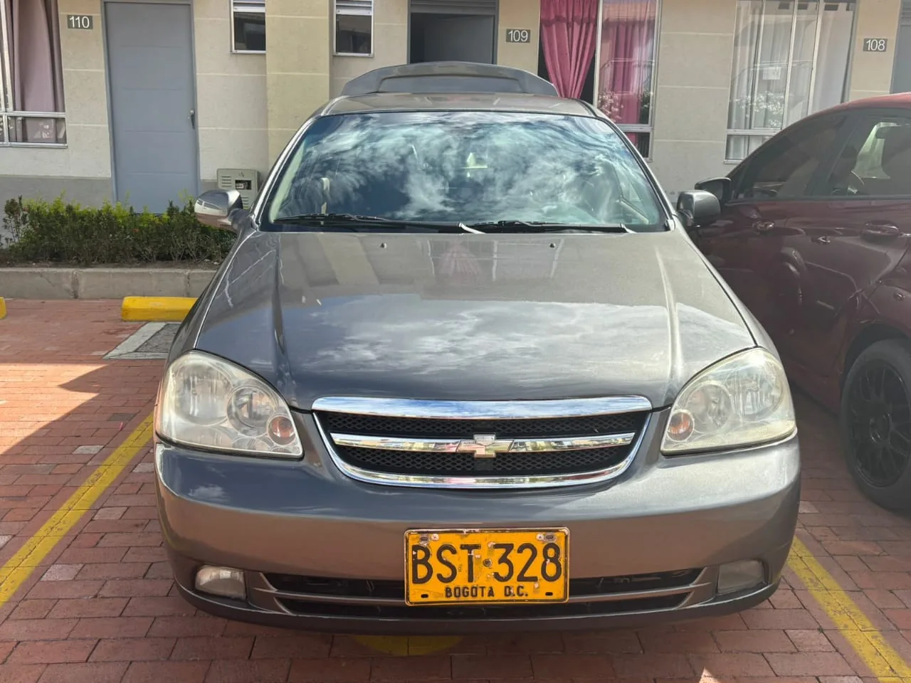 Sedã Chevrolet Optra 2006 en Ibagué — foto 2