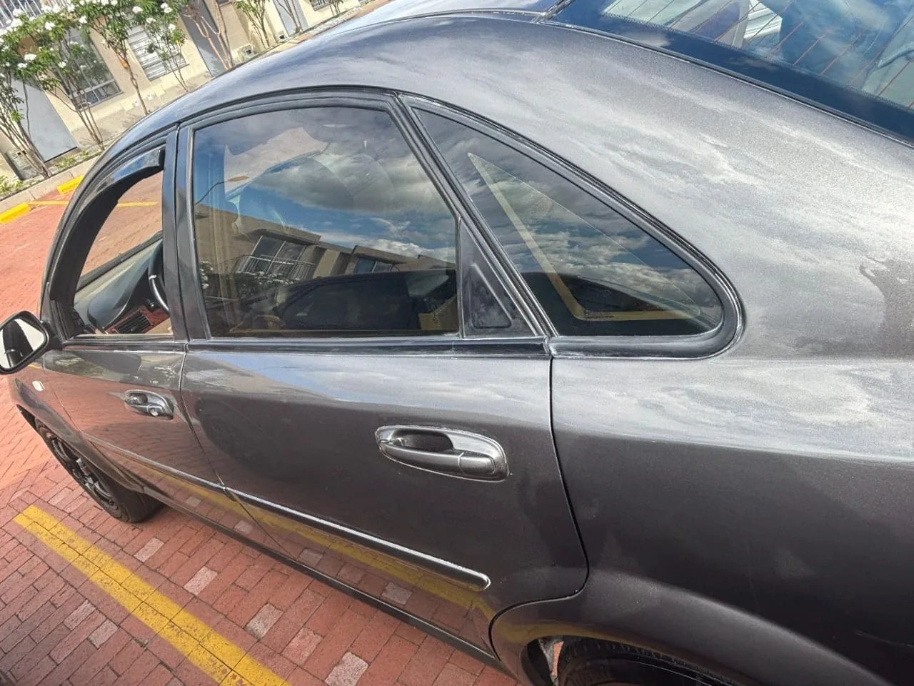 Sedã Chevrolet Optra 2006 en Ibagué — foto 14