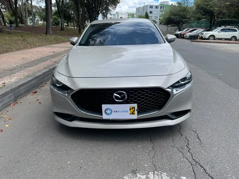 Mazda 3 2024 Touring color beige, Sedán — foto 2 de 13