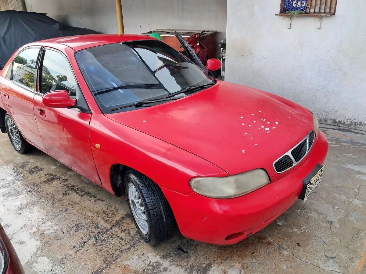 Daewoo Nubira 1999 Rojo Ciénaga