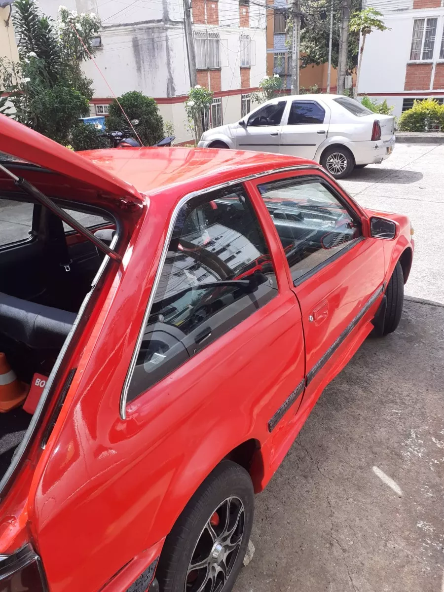 Mazda 323 1.3 He año 1996