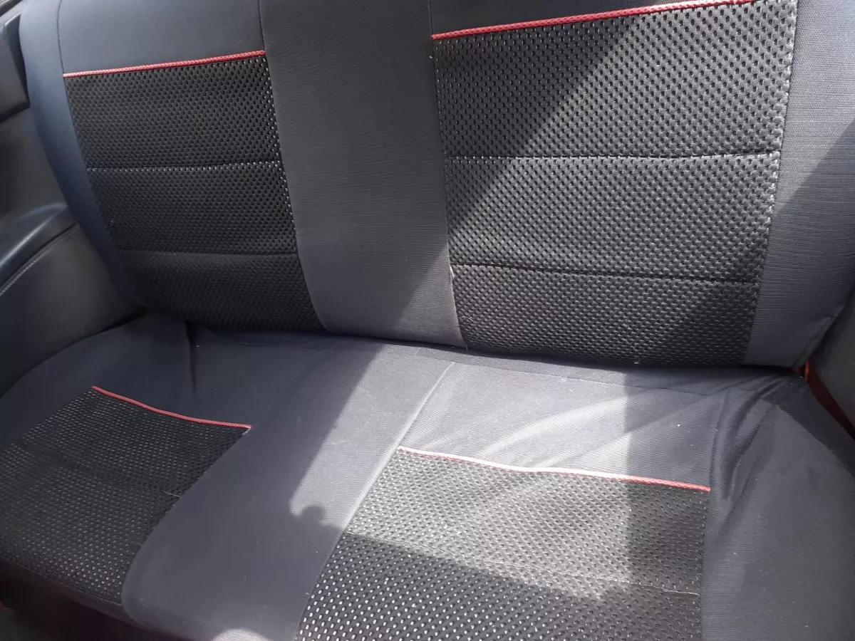 Mazda 323 1.3 He año 1996