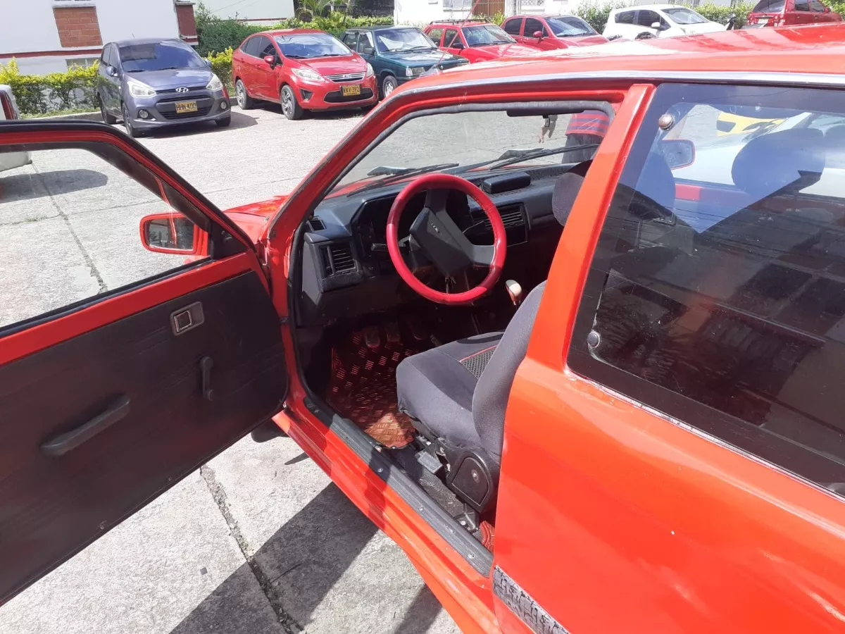 Mazda 323 1.3 He año 1996