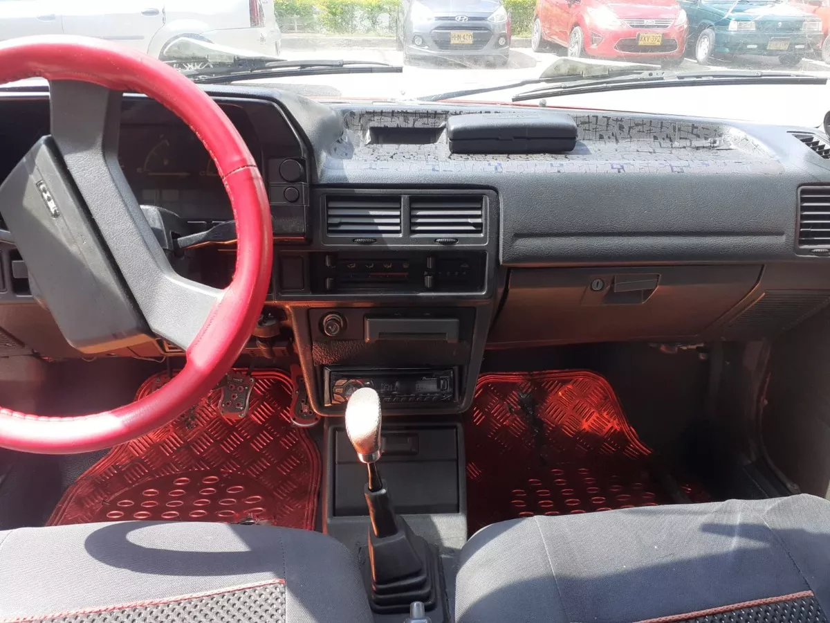 Mazda 323 1.3 He año 1996
