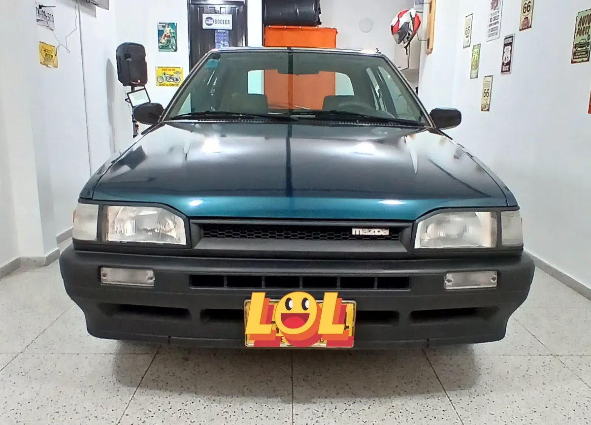 Mazda 323 1997 Verde Bogotá