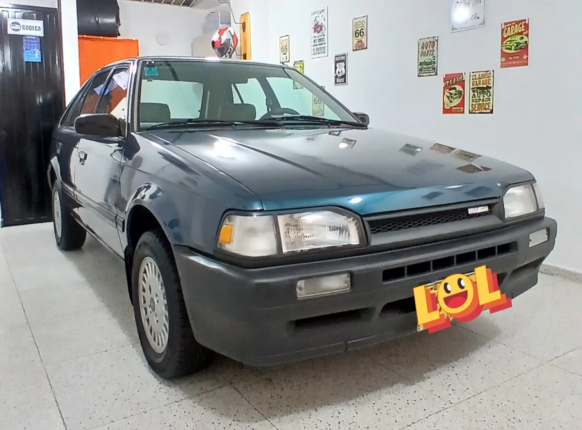 Mazda 323 1997 Verde Bogotá