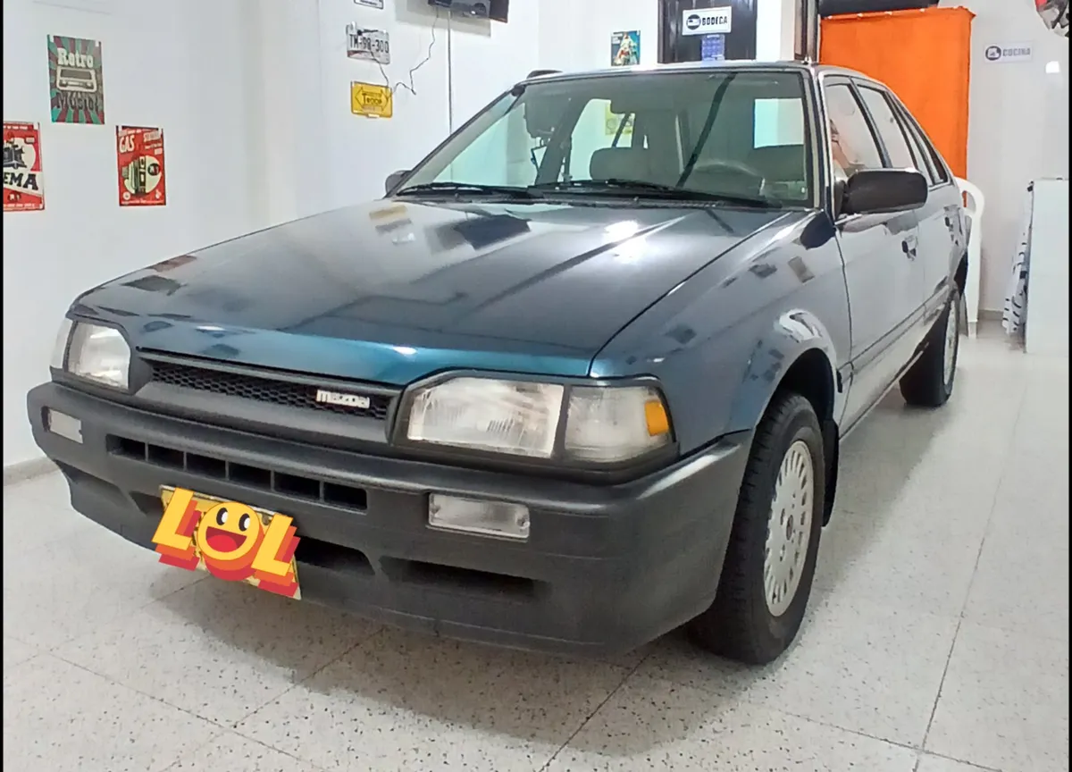 Mazda 323 1997 Verde Bogotá