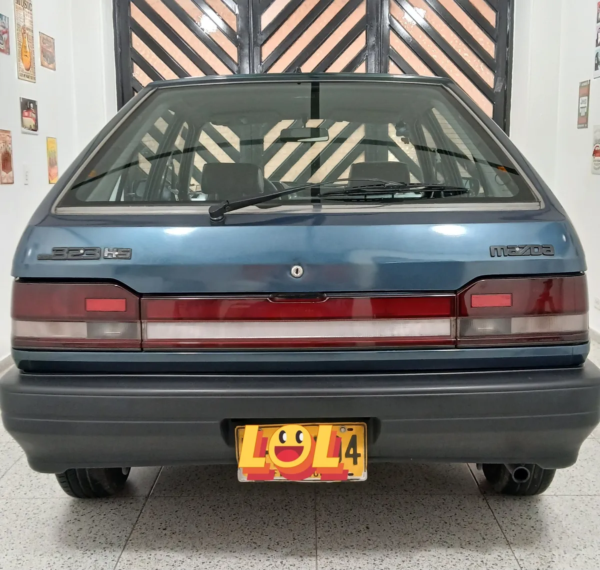 Mazda 323 1997 Verde Bogotá