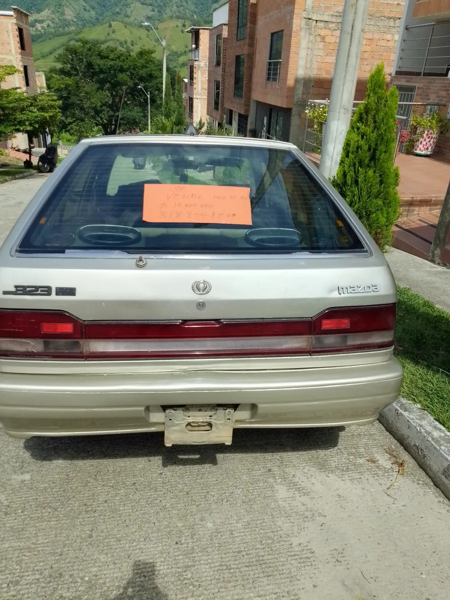 Mazda 323 1995 Gris Hispania