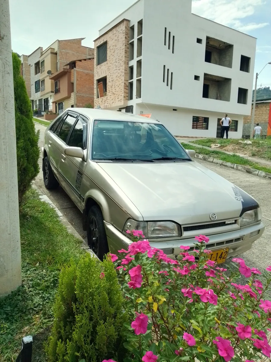 Mazda 323 1995 Gris Hispania