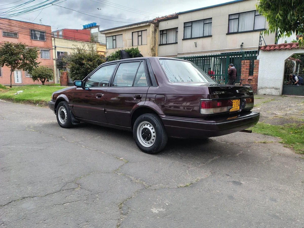 Mazda 323 1994 Vinotinto Bogotá