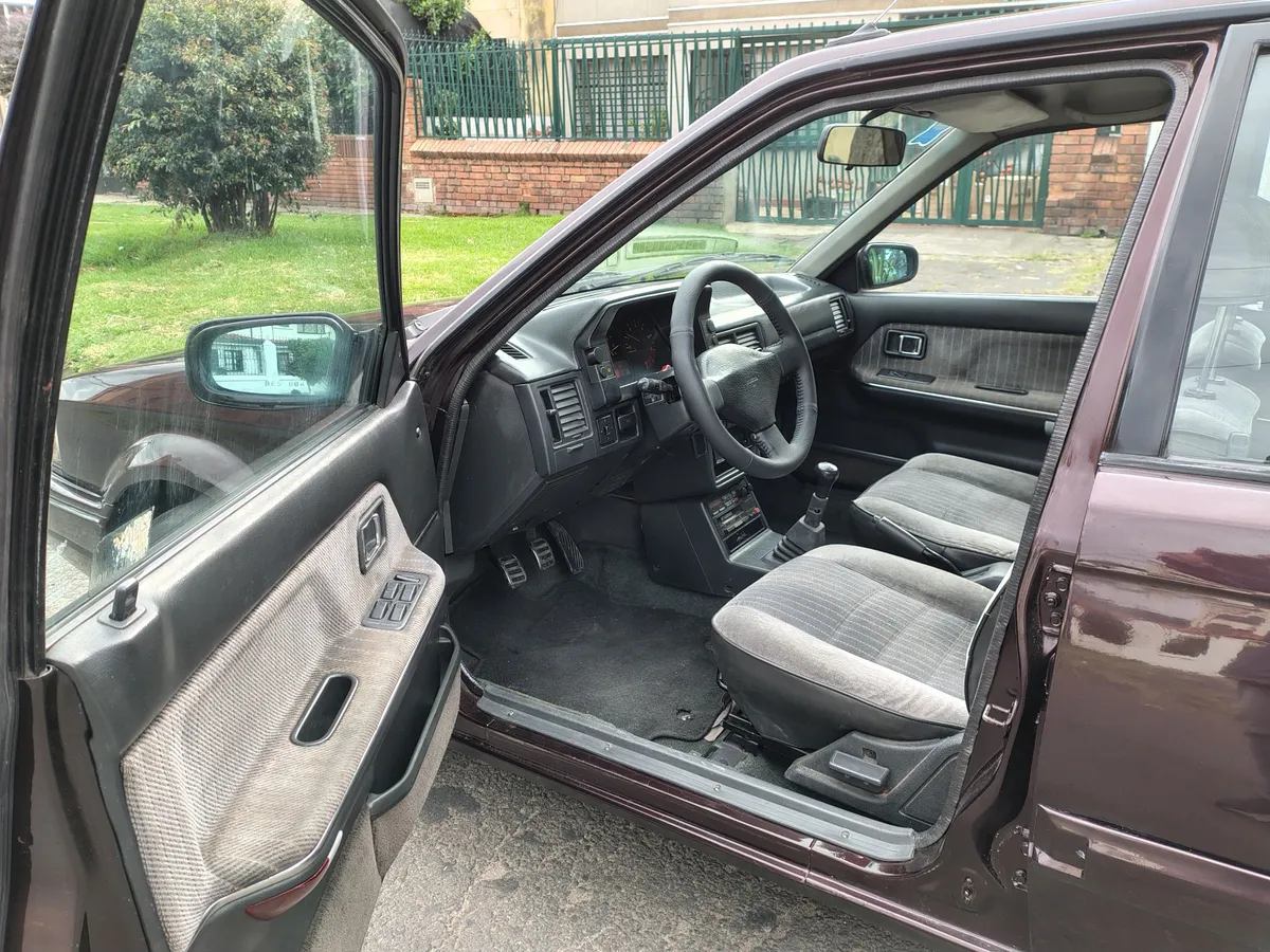 Mazda 323 1994 Vinotinto Bogotá